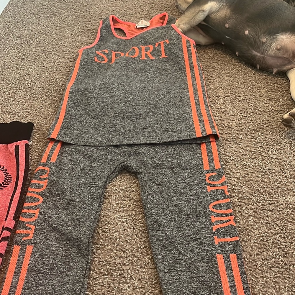 2 pairs of leggings with matching racer back tank